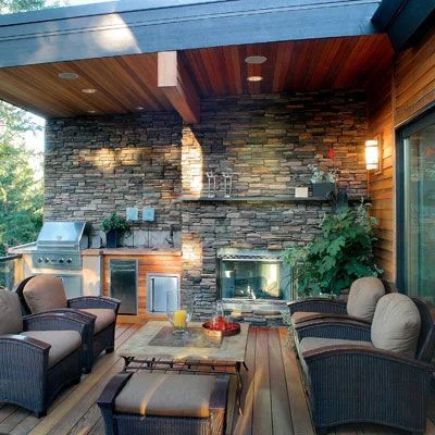 The ability to prepare your meals outside not only allows for great conversational elements but also ties the different zones back together. Image as seen on finehomebuilding.com