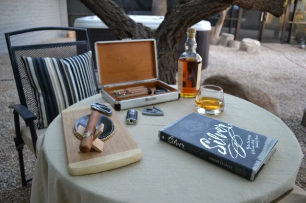 A great idea for decor is to section out an area of your backyard room where people can congregate for activities that everyone might not want to be a part of. In this case, cigars and scotch. That way, if you aren't much of a cigar or scotch person you can steer clear if you aren't interested. Image used with permission from MAAX Spas