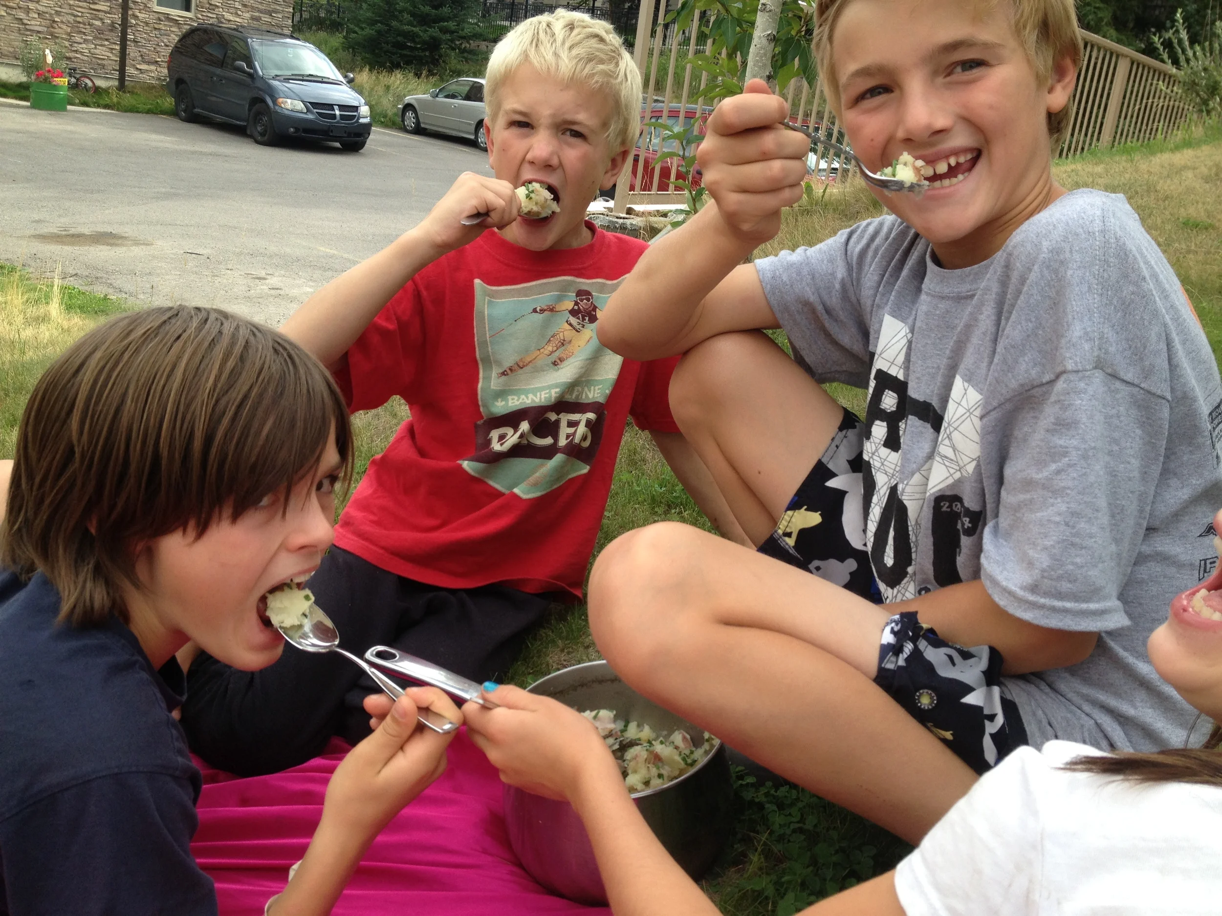 My son and his friends - pretty proud after harvesting the potatoes from our garden and making mashed potatoes. Super proud and super yum!