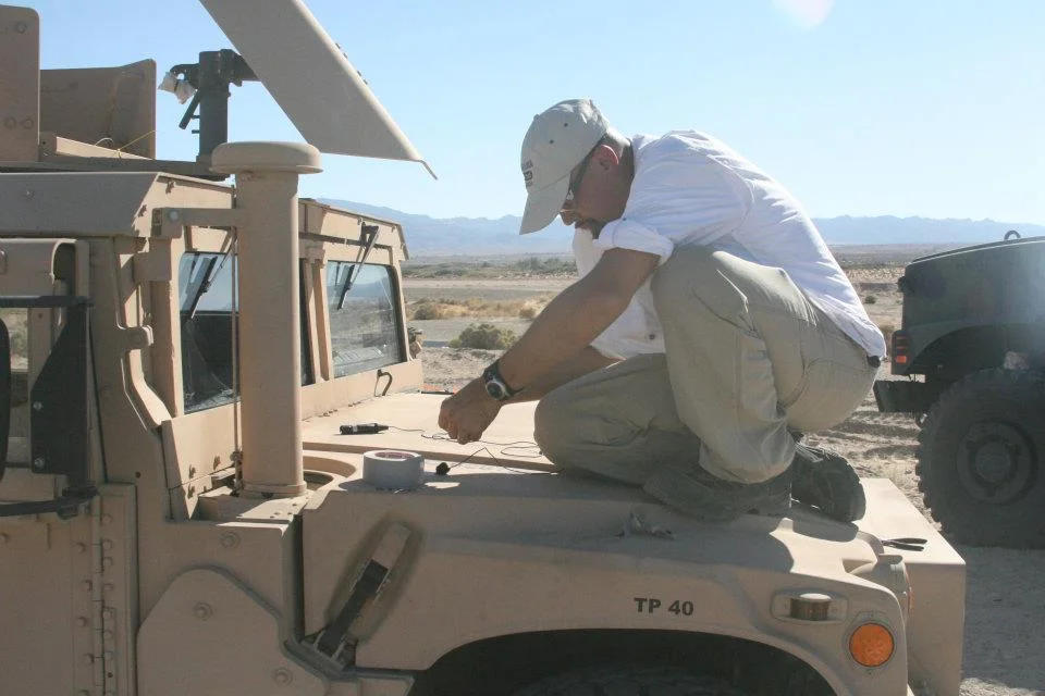 Watson & Humvee on Marine base.jpg
