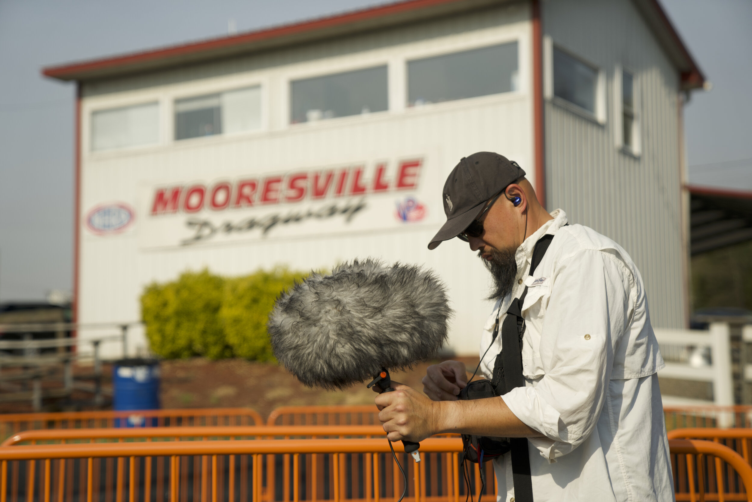 A7303872 Adjusting next to Moorseville Dragway sign.jpg