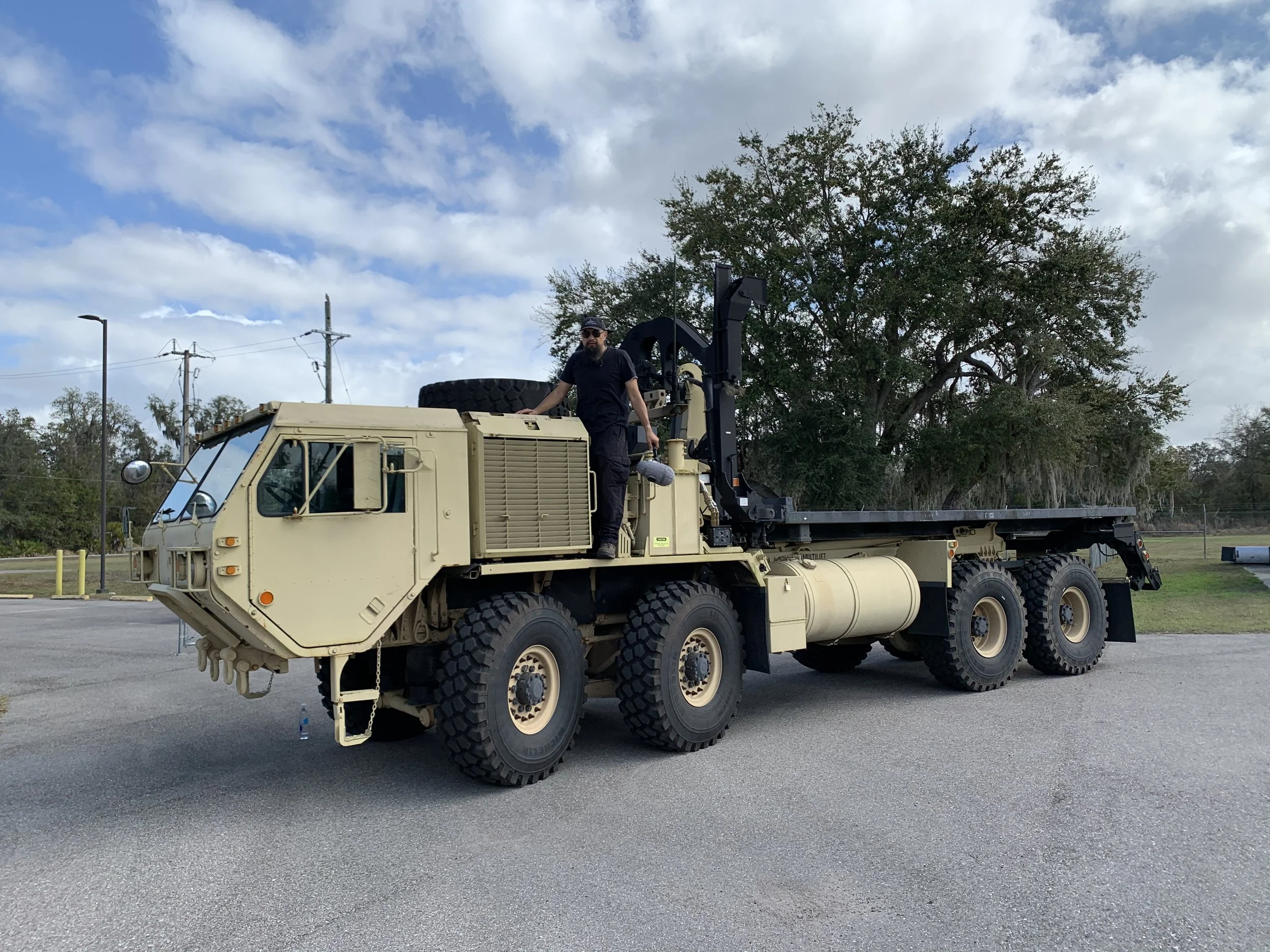 Watson on 8x8 military truck.jpg