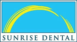 Sunrise Dental business logo featuring blue background with yellow rainbow-shaped flourish inside a rectangular frame
