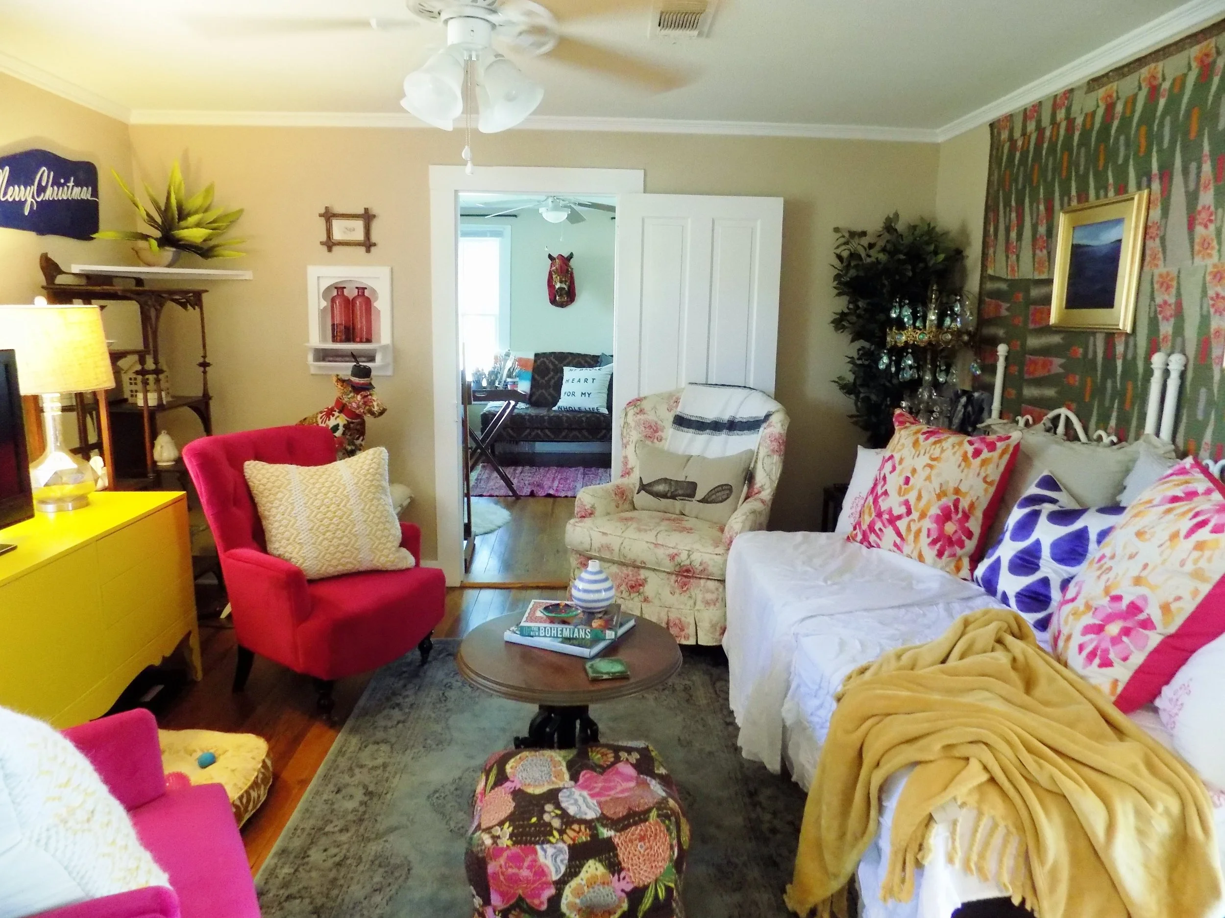  Living room view.&nbsp; Lee fell in love with her home's original details such as the built-in phone and corner shelves. 
