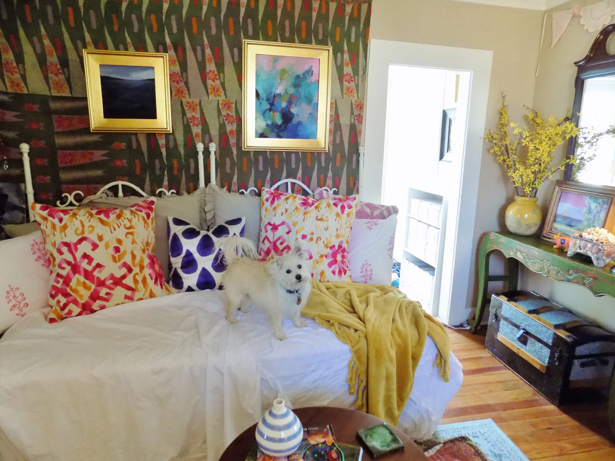  Toby smiles from the sofa which Lee created from a twin mattress and two vintage headboards 