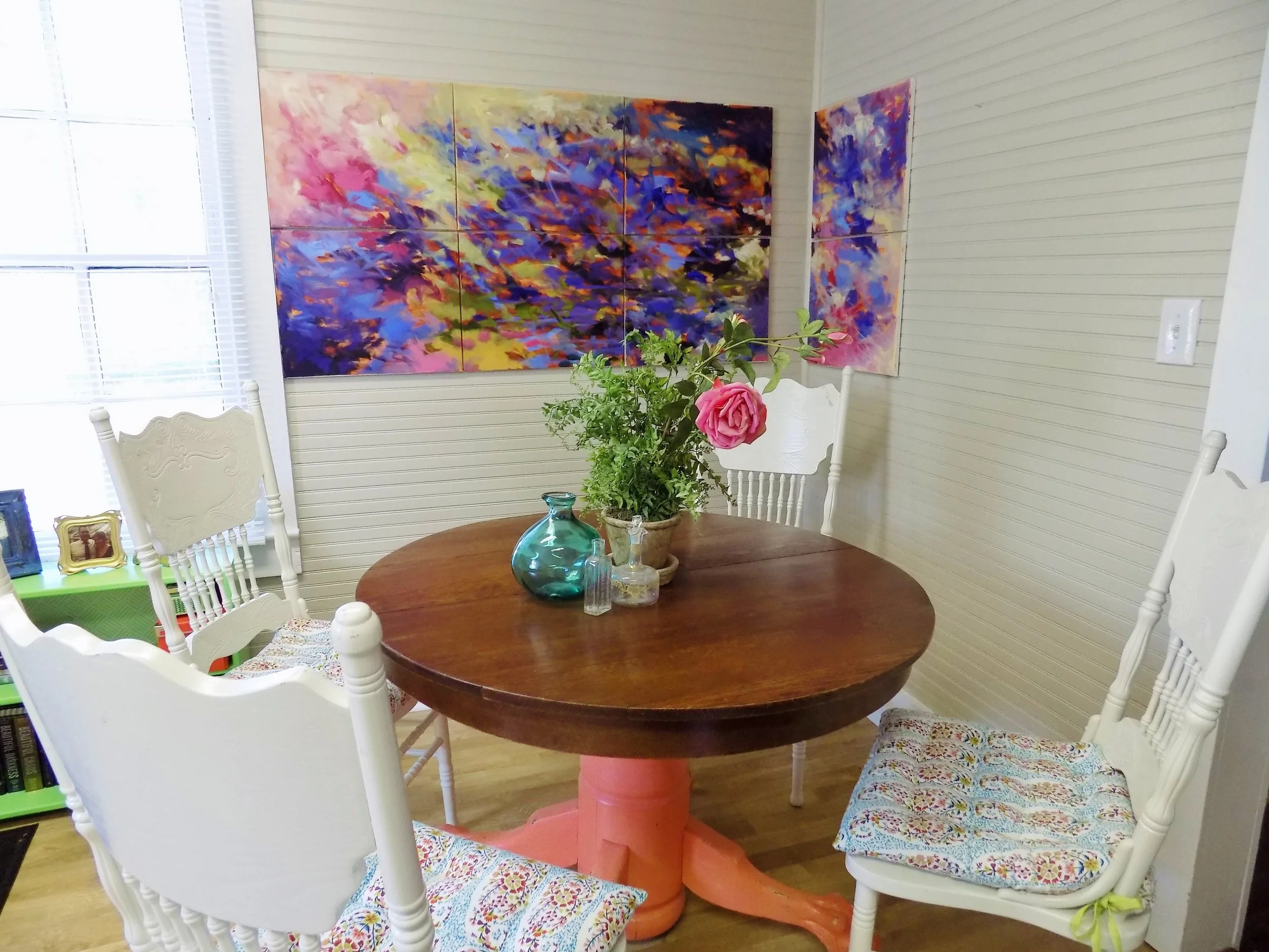  Lee's Pieced Project work hangs in the kitchen's eating nook. Created from 8 separate canvases, the piece can be hung together as pictured or separated to form 8 different pieces. 