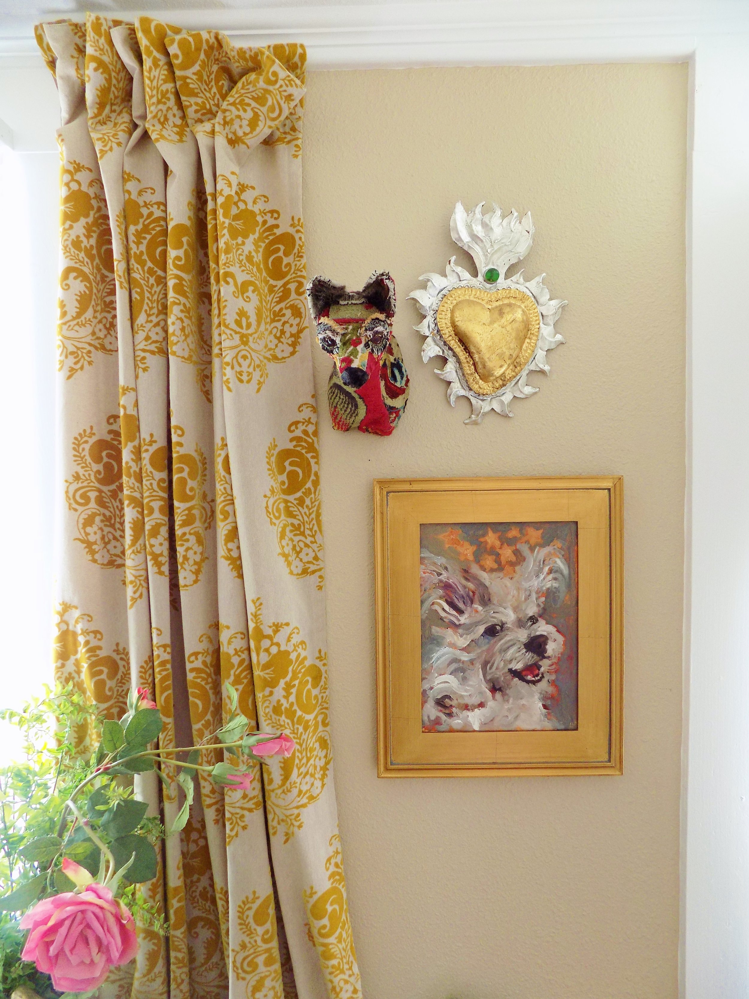  Office vingette featuring a small fox by Hadaway, a sacred heart and Lee's portrait of her beloved Toby with a crown of stars.&nbsp; 