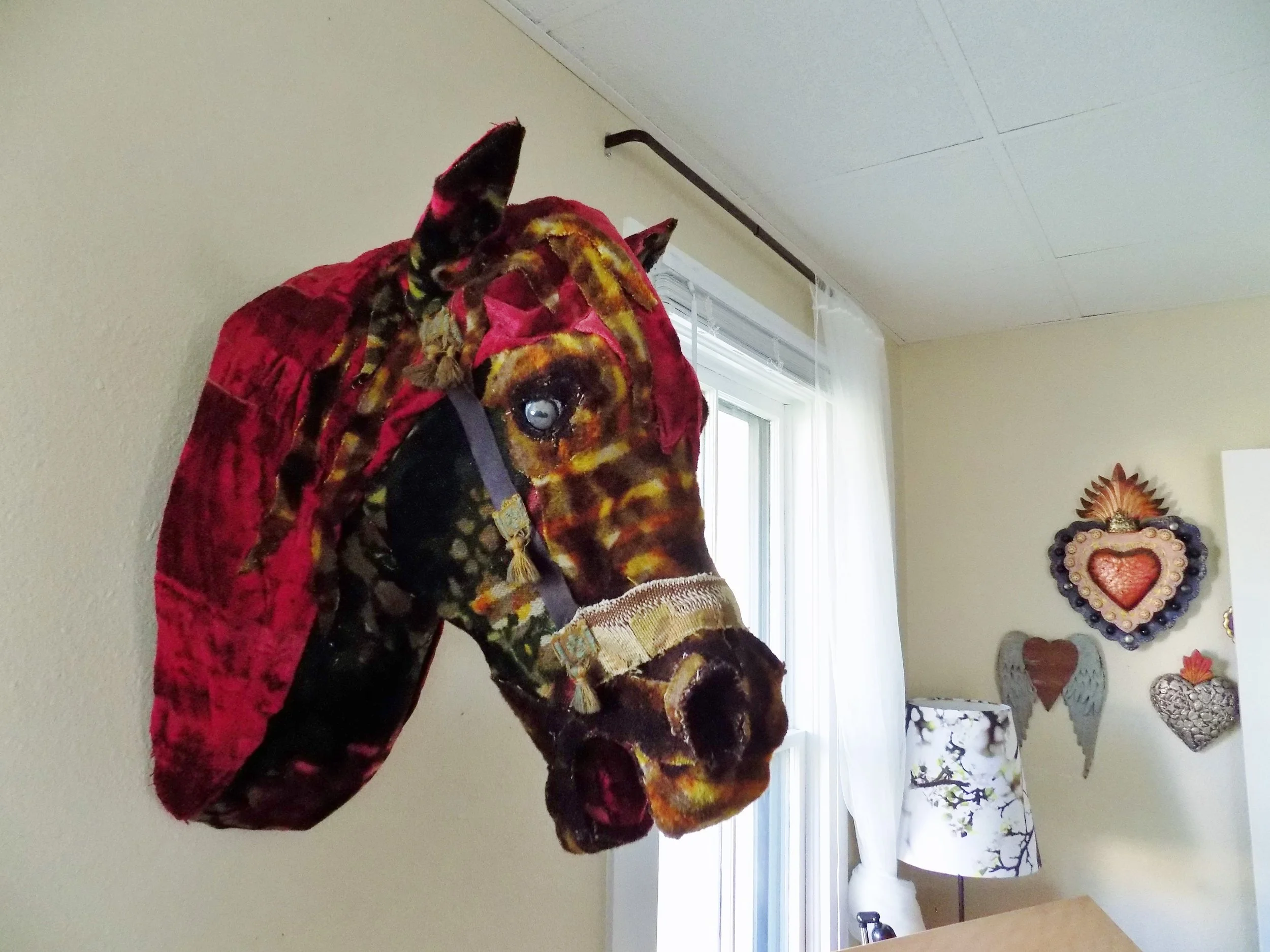  Rose Horse by Meredith Hadaway @rtexasgallery.&nbsp; This was the first piece Lee collected from her artist pal, Hadaway. The beautiful textiles collaged on the horse are vintage and the eyes are hand-painted by Hadaway. 