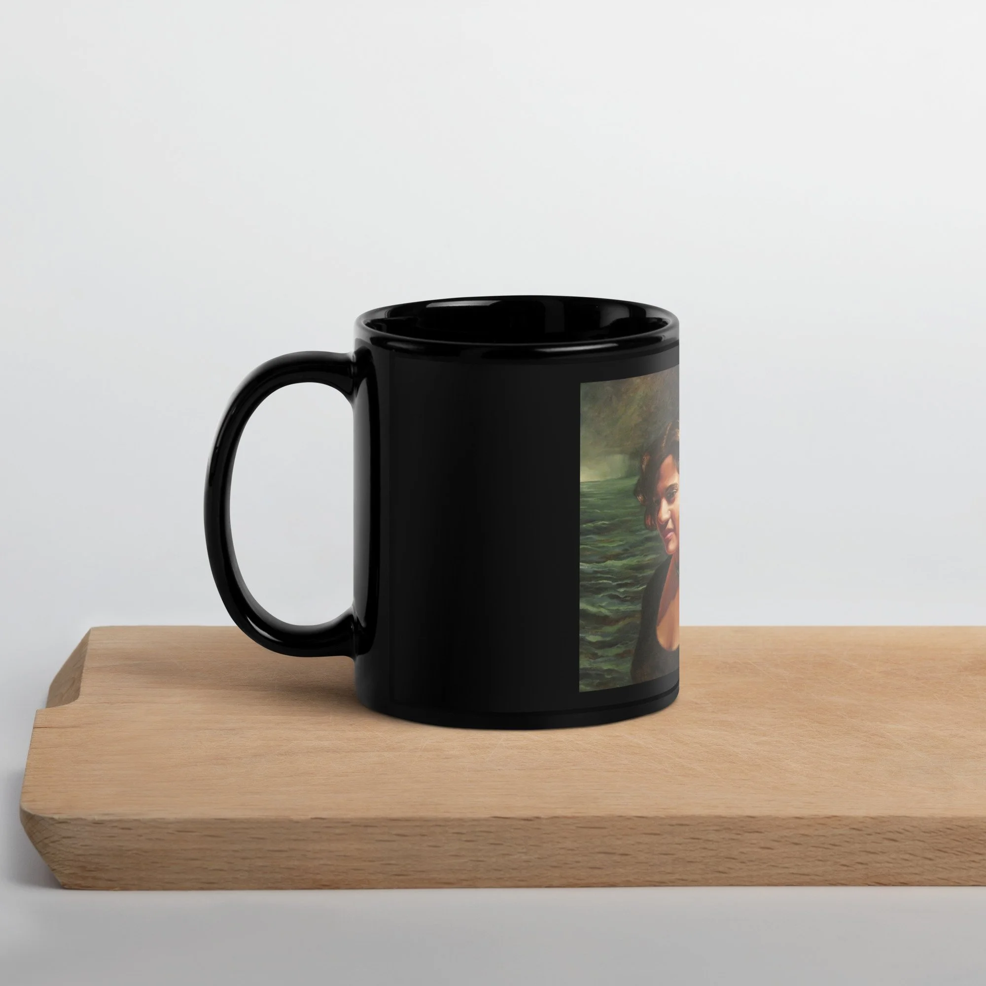 black-glossy-mug-black-11-oz-handle-on-left-67c243556e99a.jpg