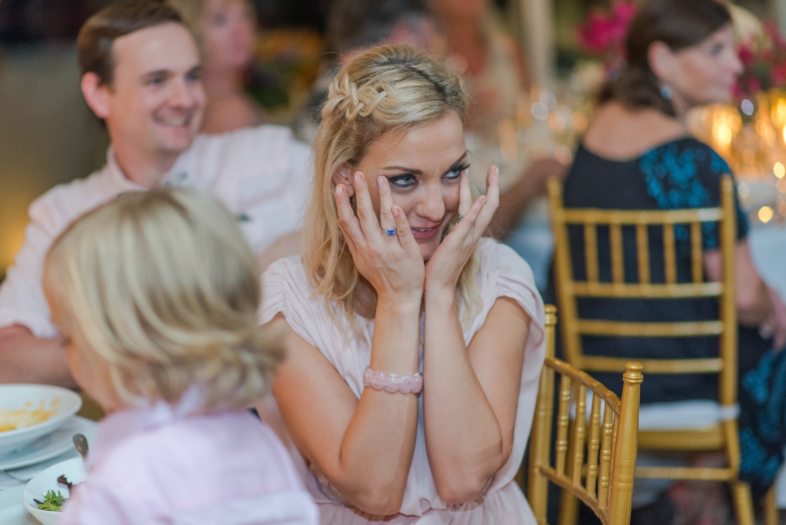Sister of the bride crying during her first dance at the reception
