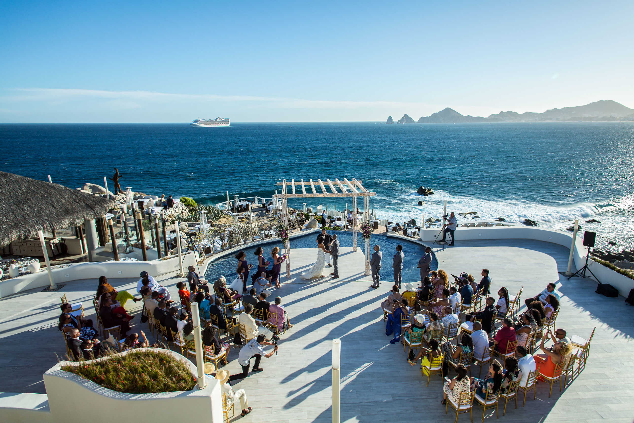  Sunset Monalisa wedding venue. Beutiful ceremony with all the gests and the ocean behind 