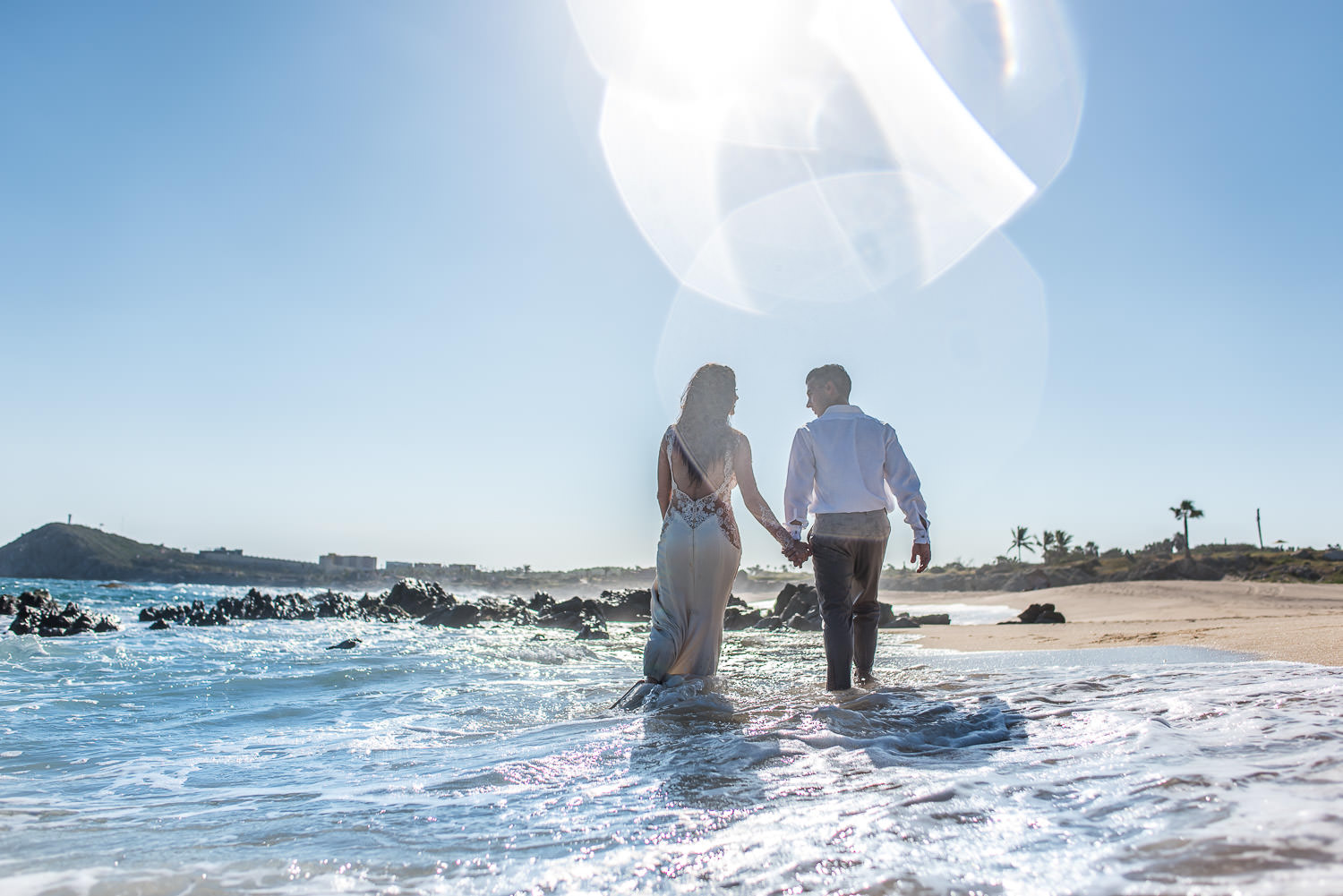 bride and groom during a trash the dress session in Los Cabos
