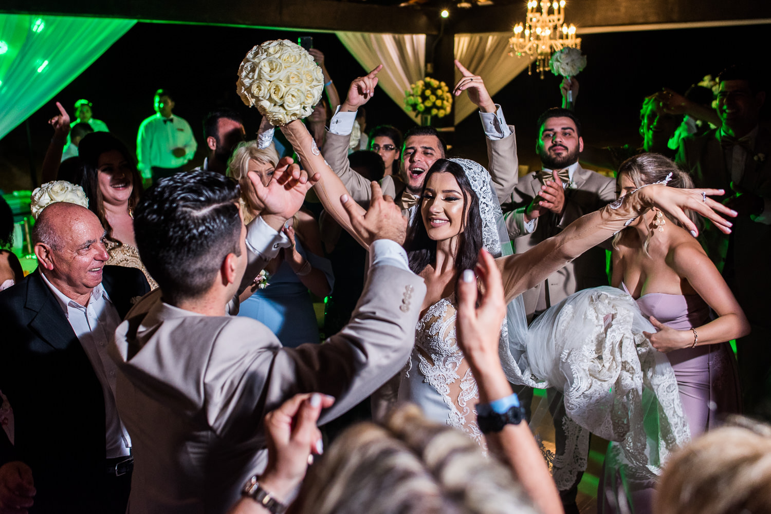  Bride dancing with family and friends 