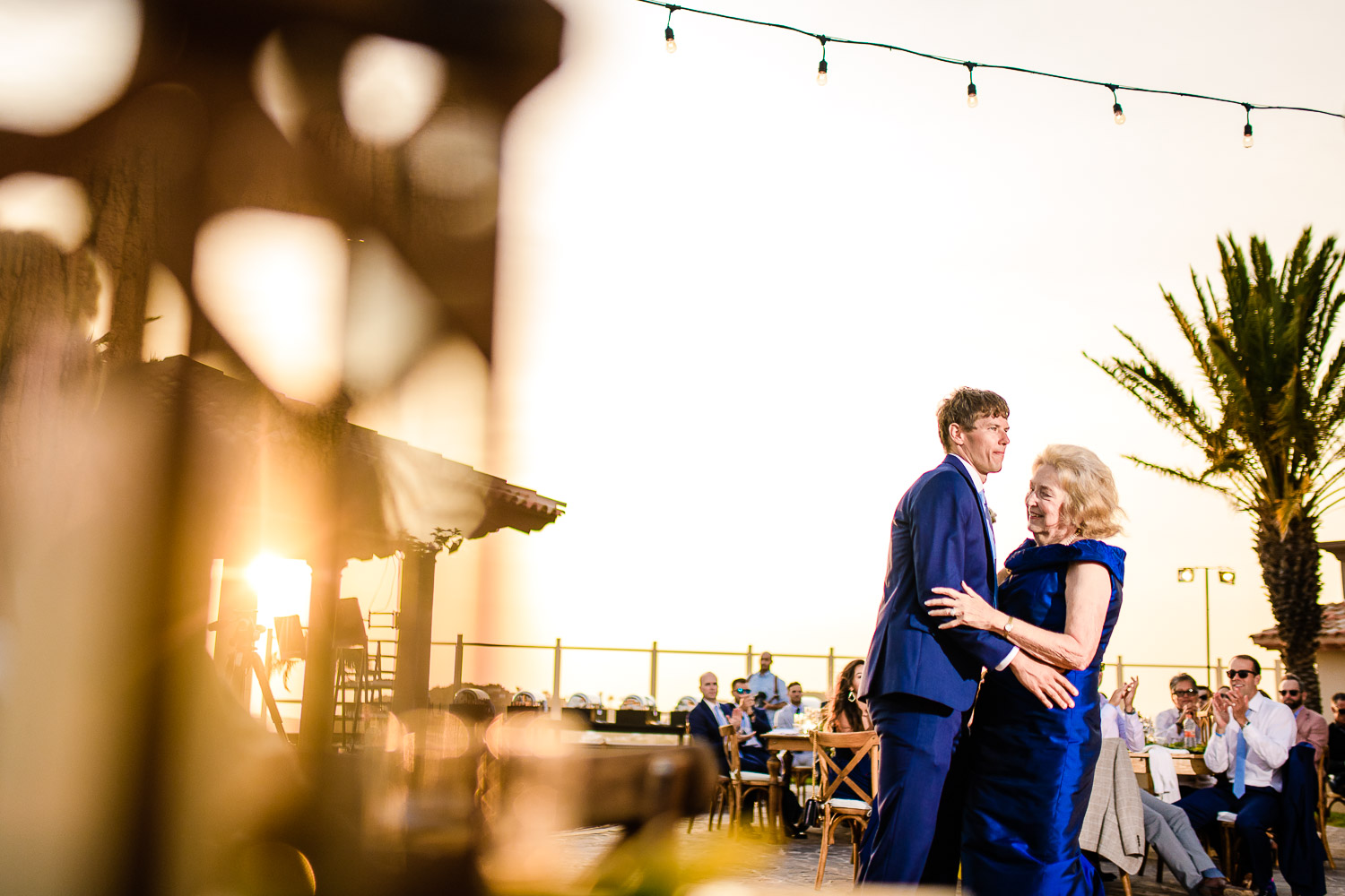  Groom and her mother during their first dance at Pueblo Bonito Sunset Beach Los Cabos. GVphotographer is an amazing Los Cabos, Mexico destination wedding professional photographer 