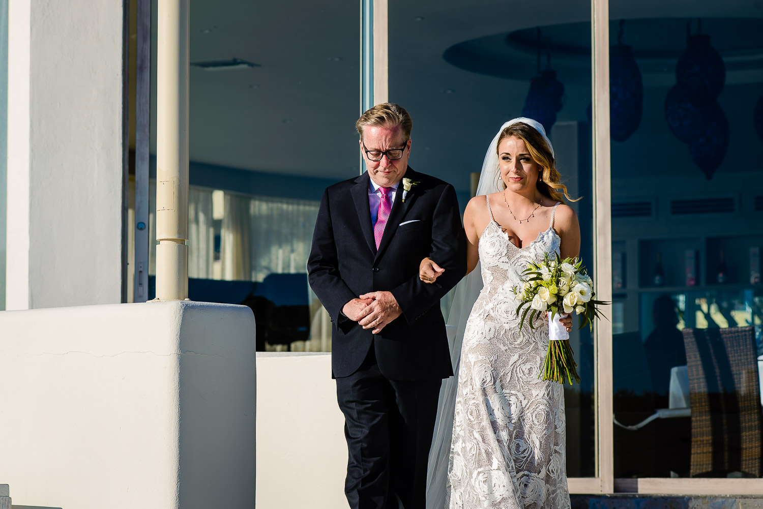  bride and father of the braid during her walking to the aisle 