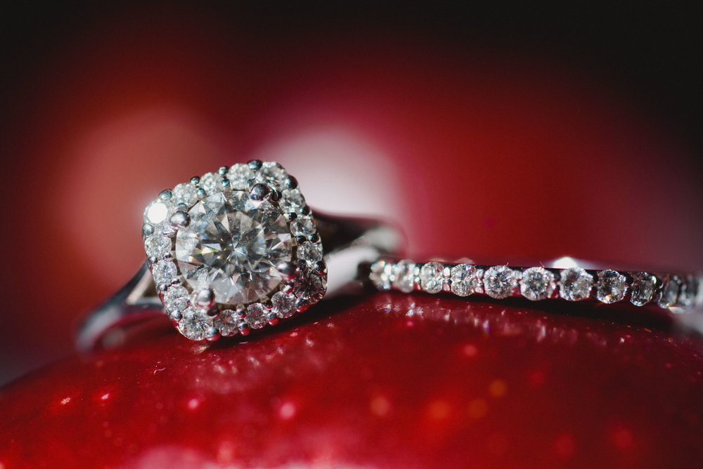 Wedding ring on an apple captured by talented Cabo Wedding photographer GVphotographer