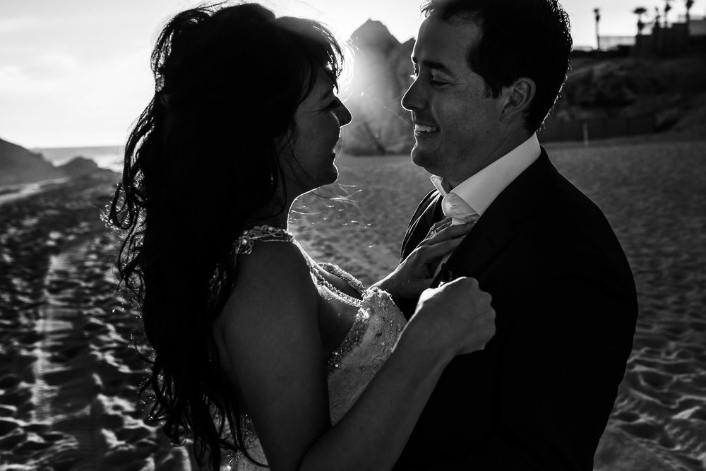 Bride and groom during their first look photo session on the beach with talented gvphotographer