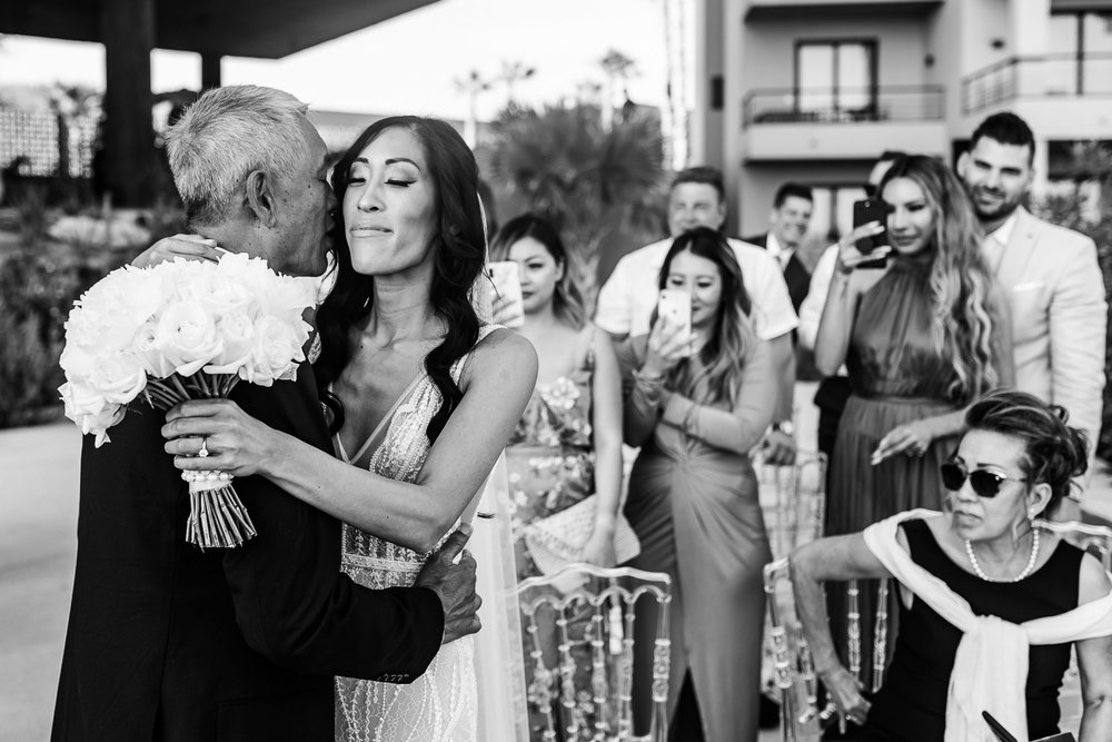  Junebug Weddings black and white photo, emotional bride hugging her father