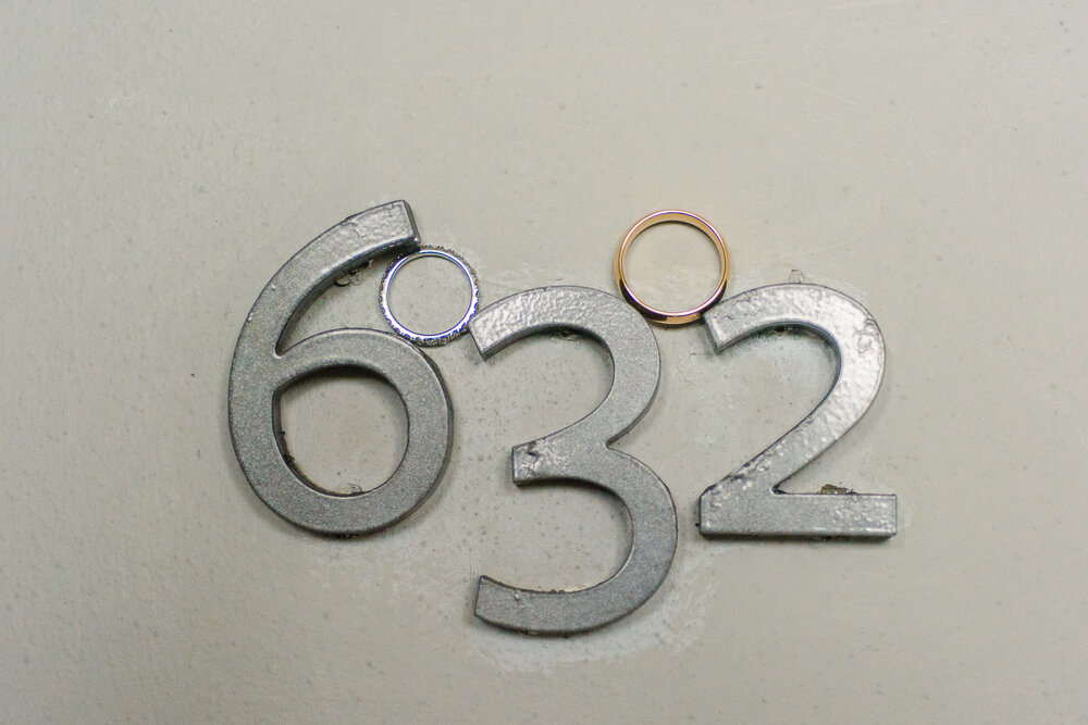 wedding rings detail on the room number at The Cape