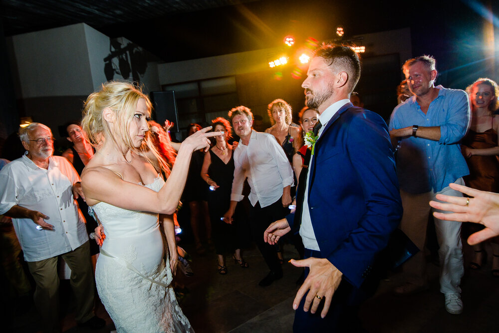 bride and groom dancing and having fun on their Cabo destination wedding