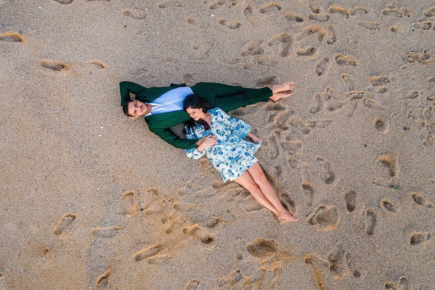 Aerial photo of this beautiful couple on the beach