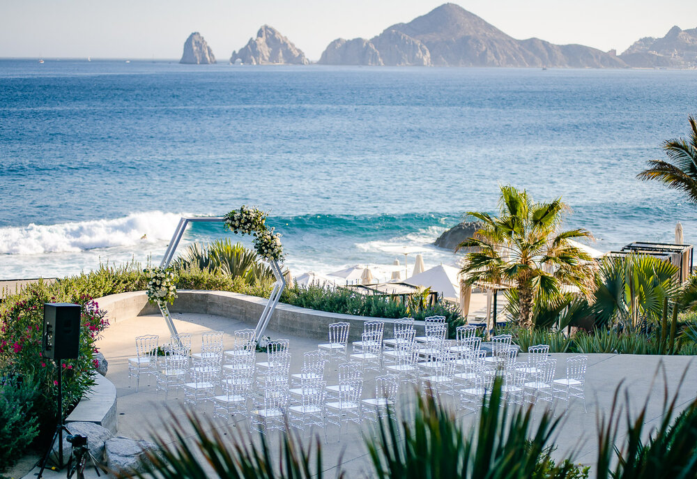 Mpdern Wedding hupa at The Cape Los Cabos with the ocean behind and the famosu Cabo Arch