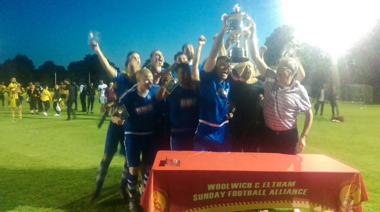 Bert Holloway's son, Colin Holloway presents Phoenix Knights with the Bert Holloway Cup