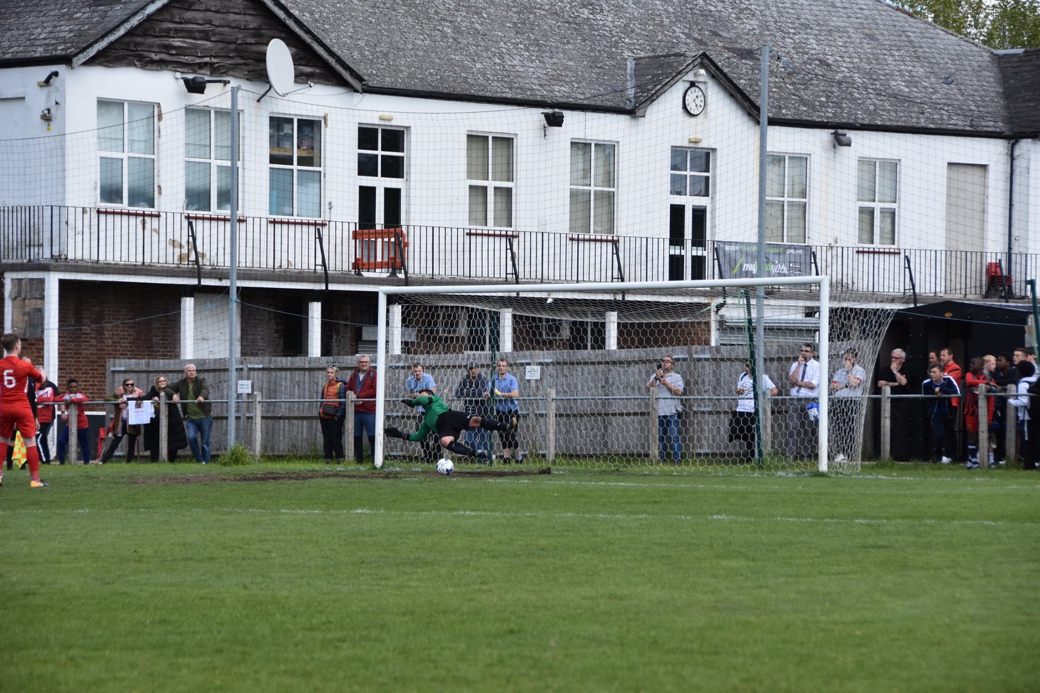 Vanbrugh’s goalkeeper sticks out a trailing foot to win the match for his side on Penalties.