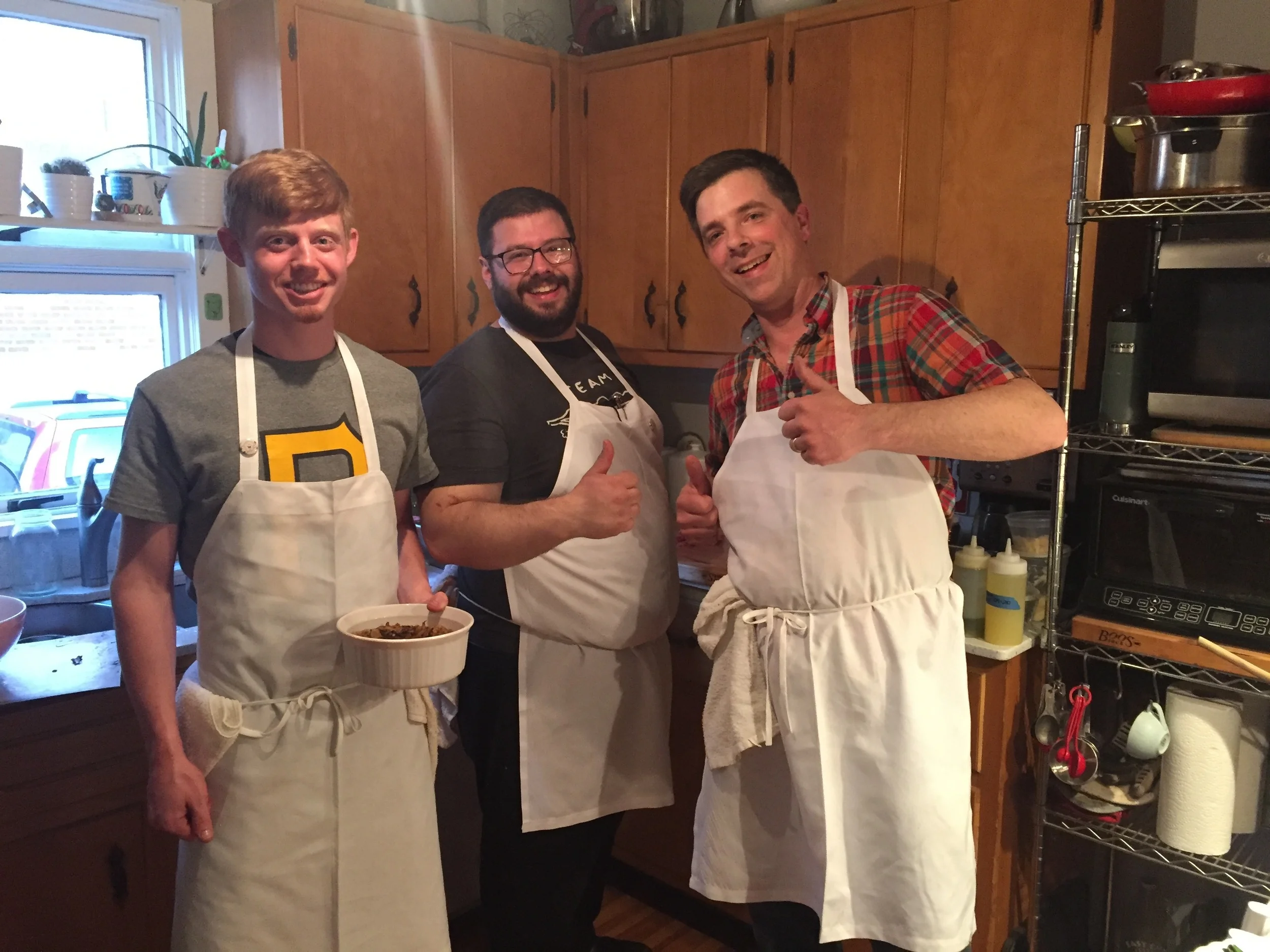 Matt, and Chefs Tom and Trevett in the kitchen.
