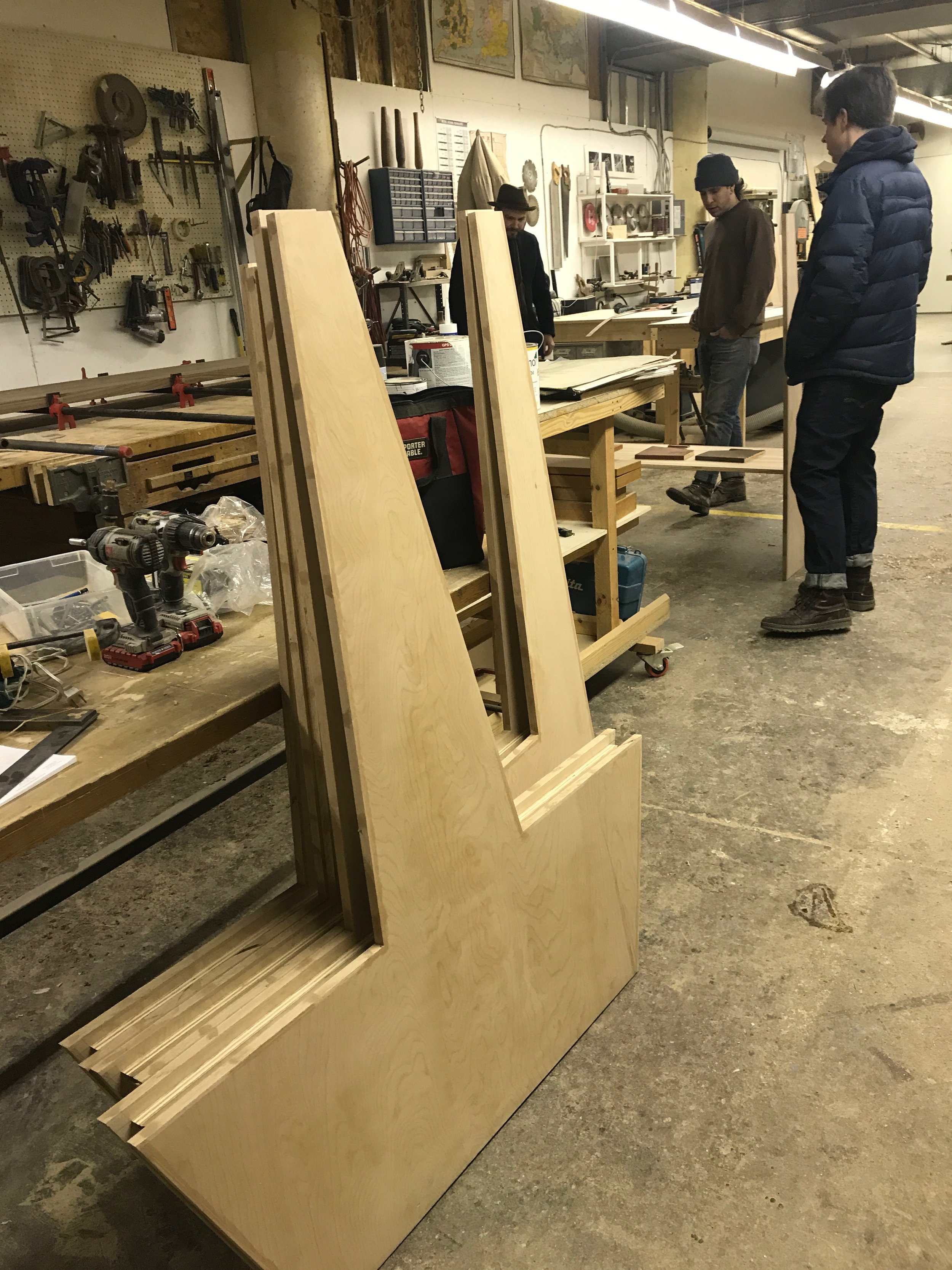 Meeting Steven the Carpenter at his workshop in Manchester to check out the booths, match stains, and discuss tabletops.