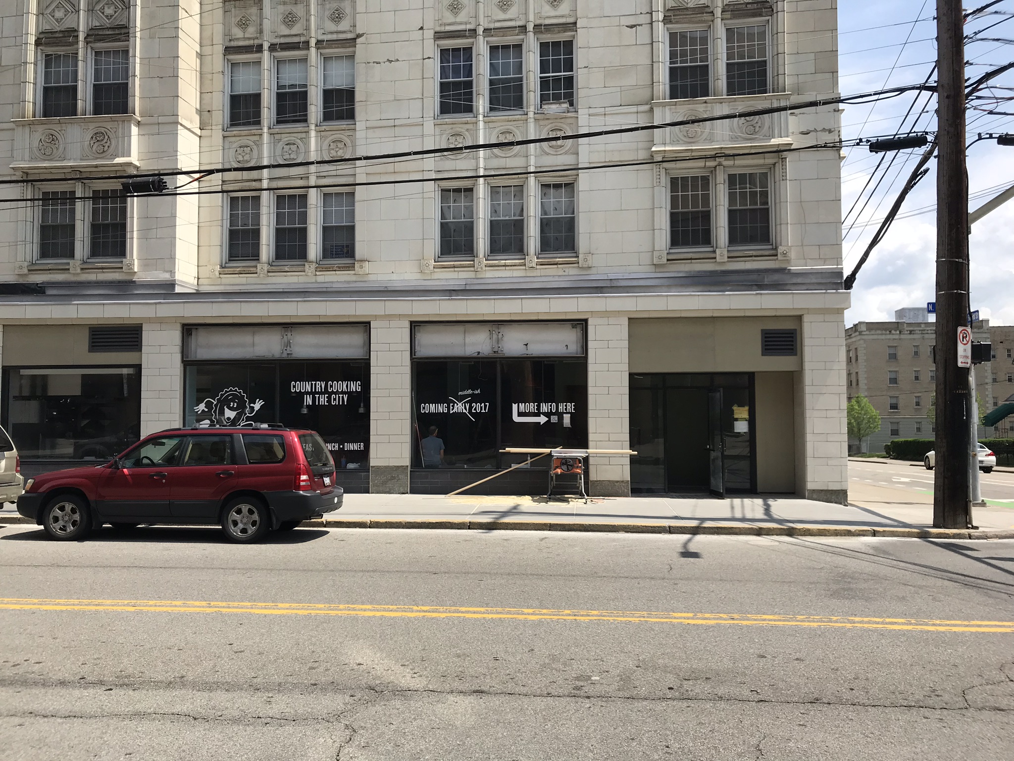 Starting to claim the corner with vinyl signs in the windows. We opted not to cover the windows with paper during construction so the neighbors could watch their future neighborhood diner taking shape.