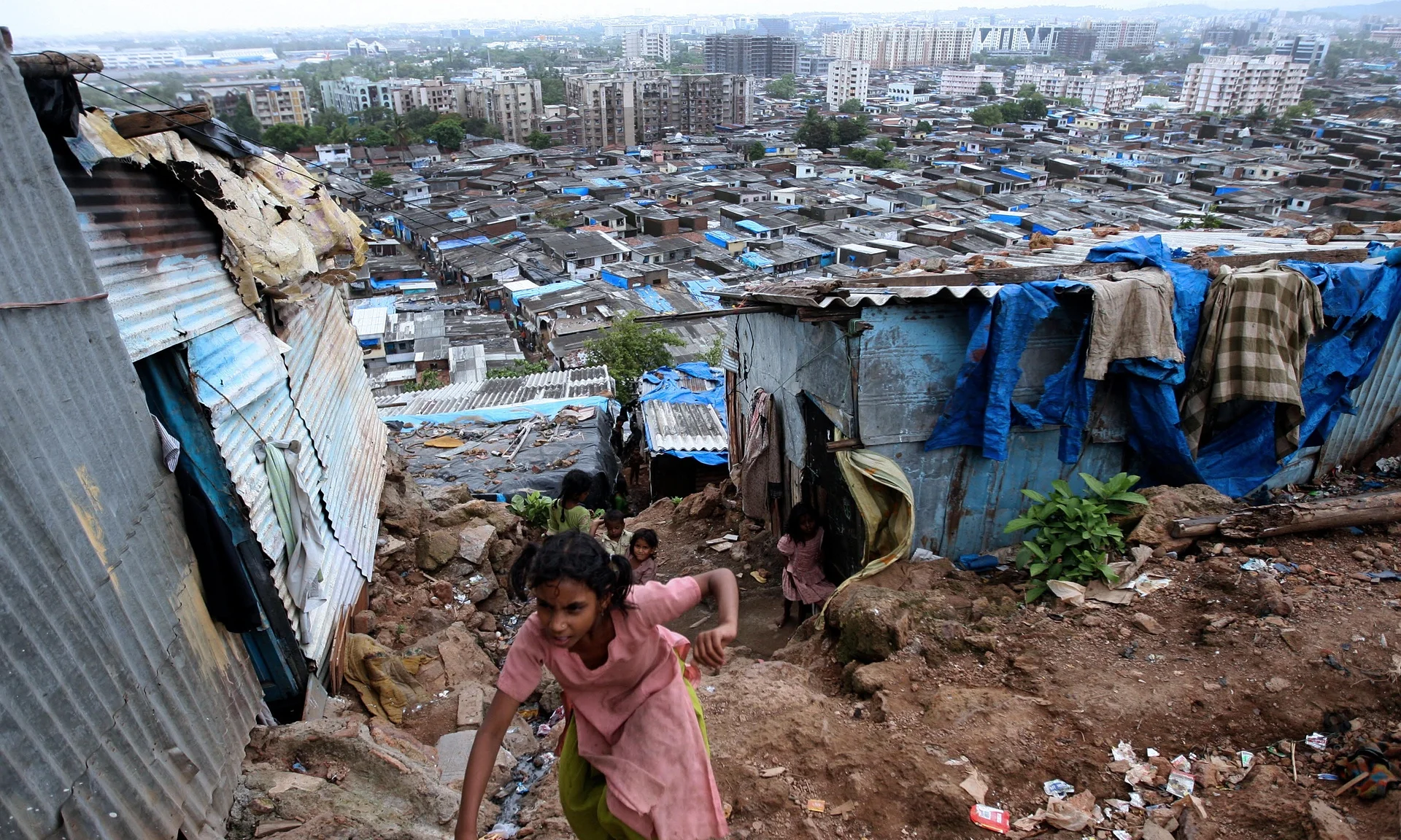 Central Mumbai: ‘The most freighted of all words in the story of a city is the word “slum”.’ Photograph: Pal Pillai/AFP/Getty Images