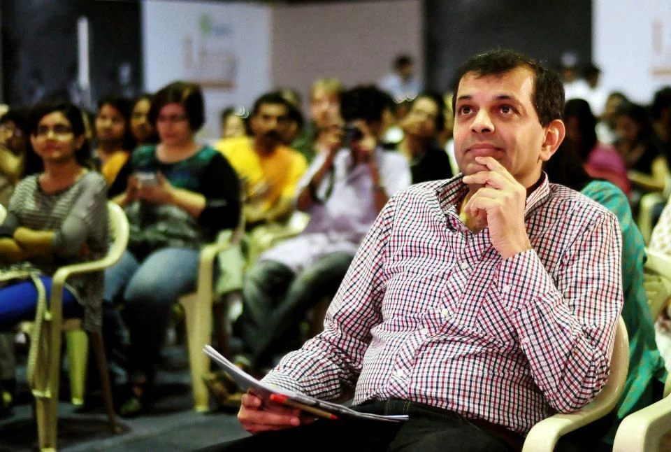 Author Suketu Mehta, right foreground.