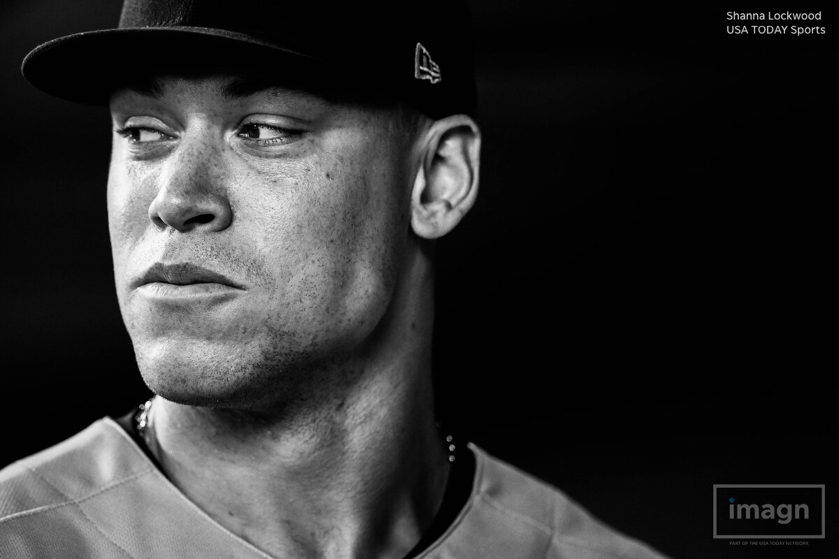 uMay 3, 2018; Houston, TX, USA; New York Yankees right fielder Aaron Judge (99) looks on from the dugout before the game against the Houston Astros at Minute Maid Park. Mandatory Credit: Shanna Lockwood-USA TODAY Sports