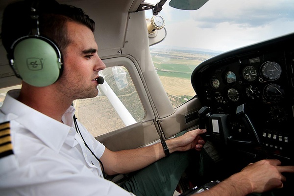 Wholey at the controls. He obtained his pilot's license when he was 18./Photo by Jennaye Derge