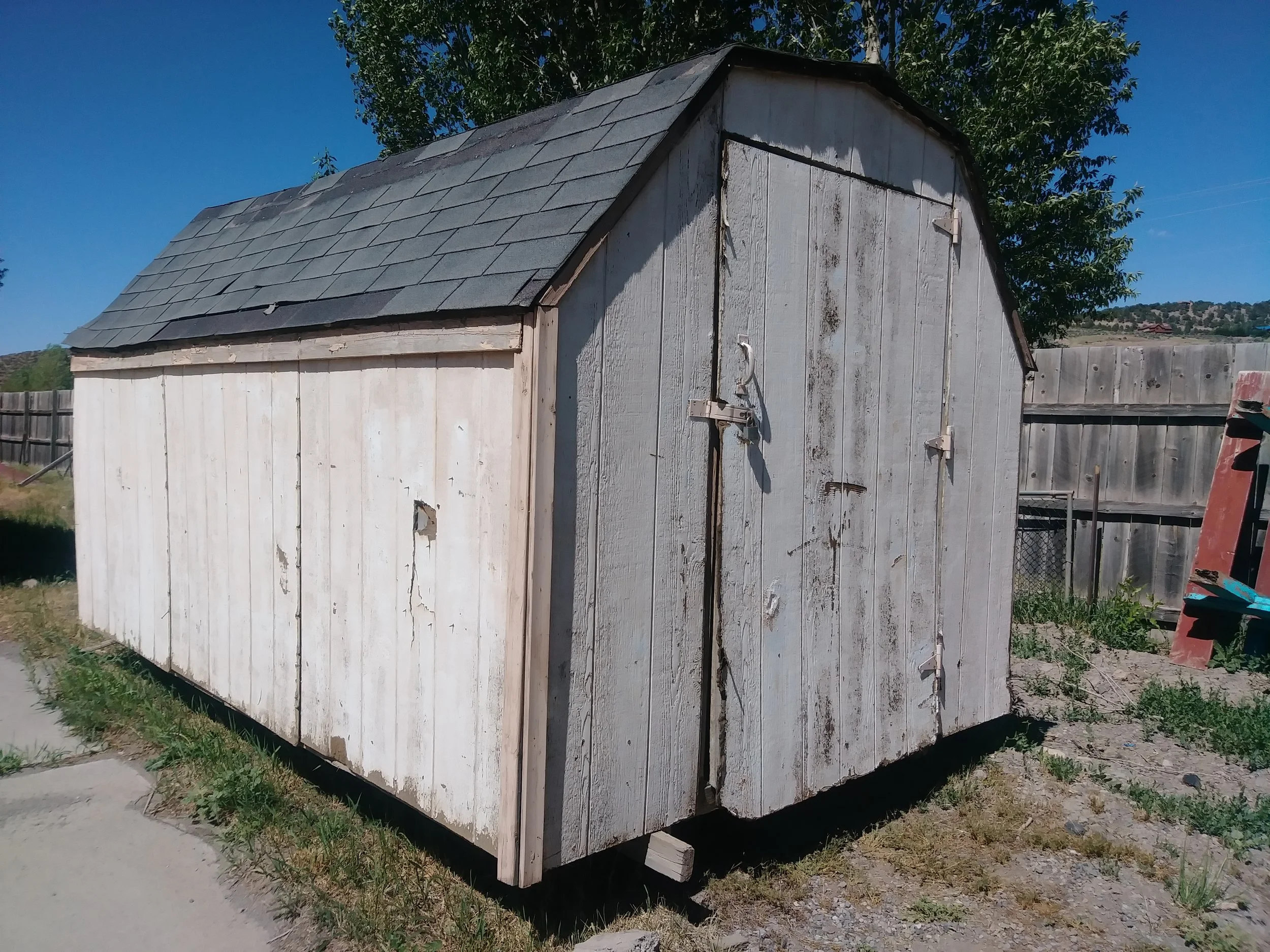 This is our current shed… it is broken down and needs to go!