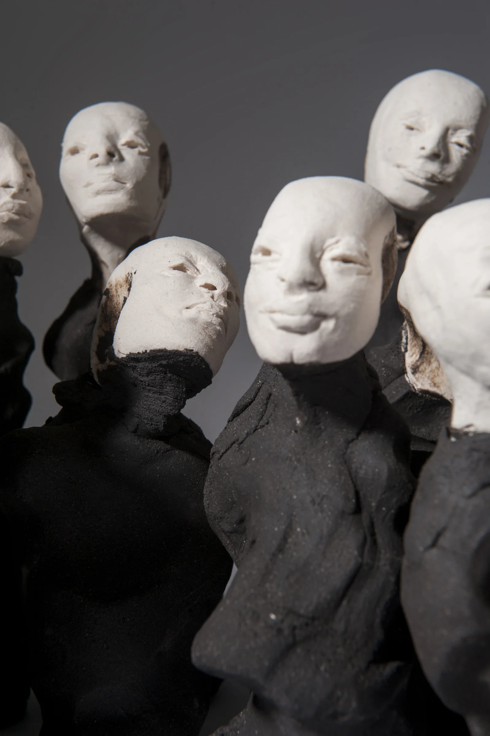 Crowd I \ porcelain and black clay \ dimensions variable \ Norwood Photography.