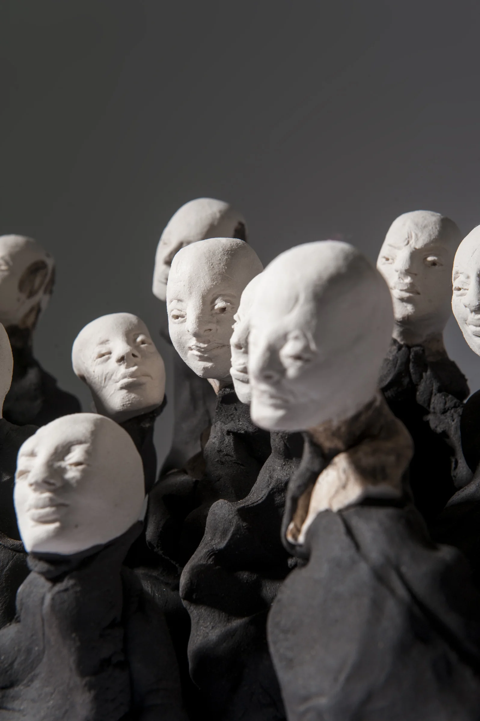 Crowd I \ porcelain and black clay \ dimensions variable \ Norwood Photography.