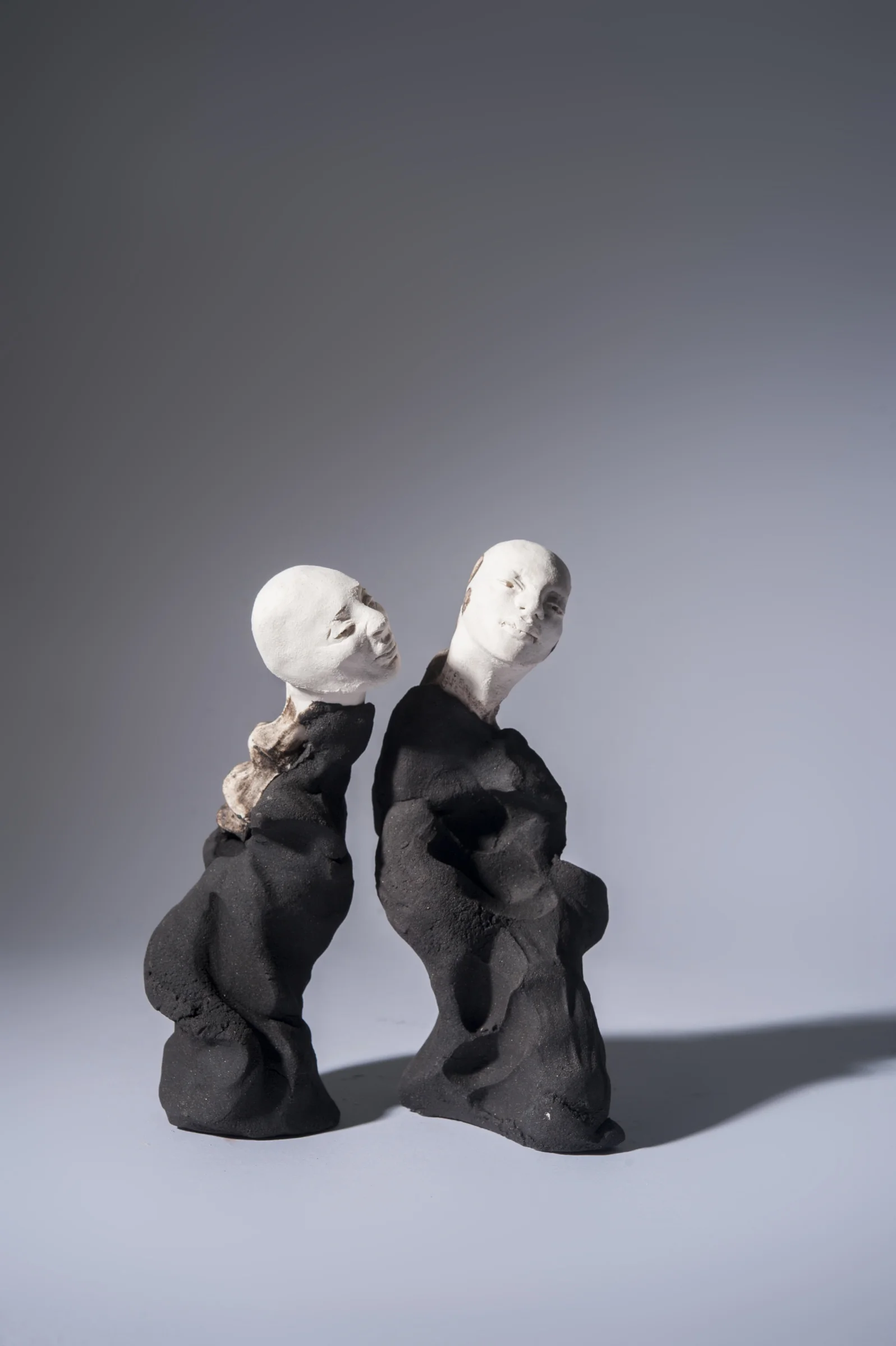 The Widow and The Dancer \ porcelain and black clay \ 19cm x 7 cm, 18cm x 6cm \ Norwood Photography.