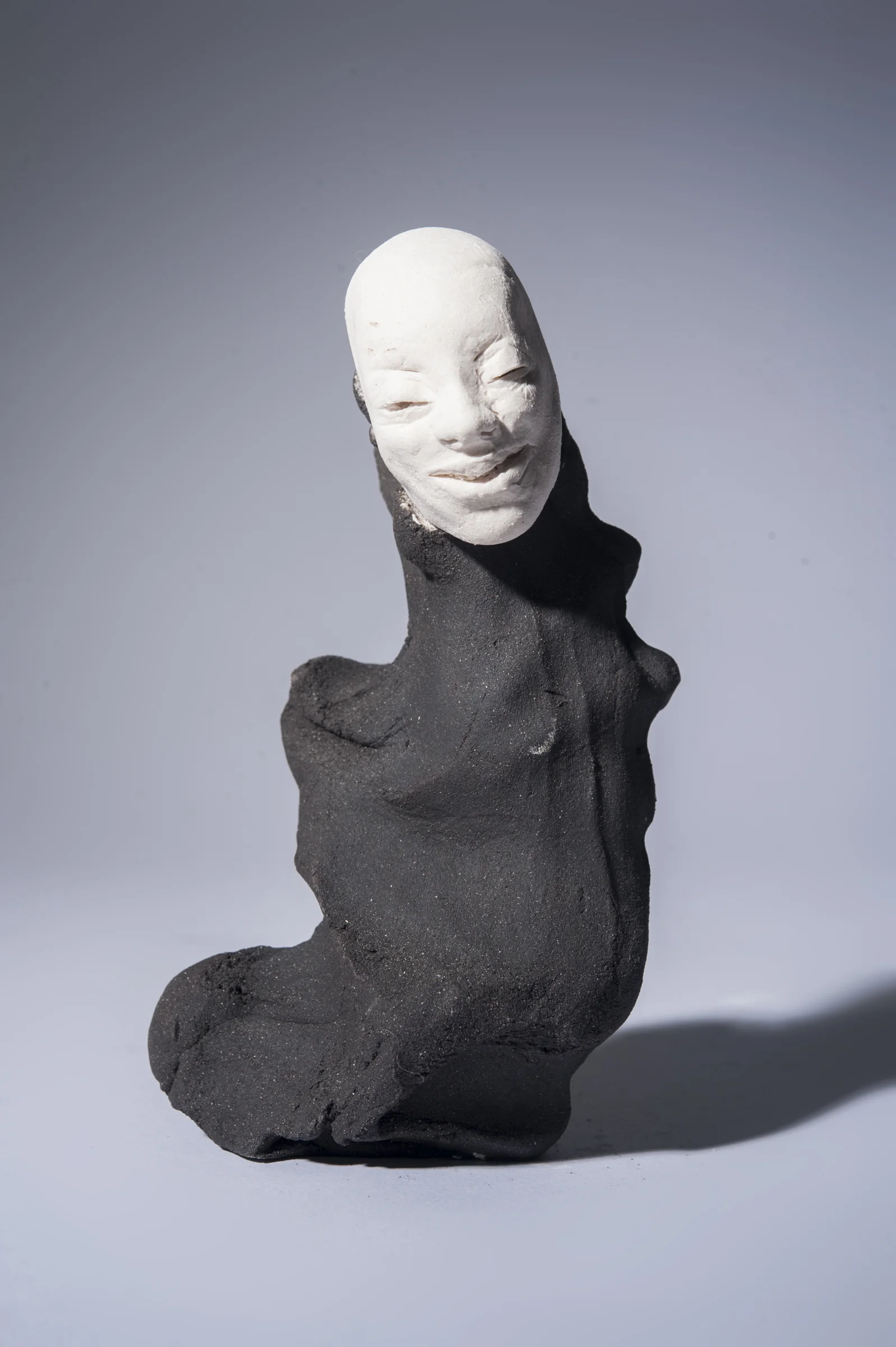 The Mischief Maker \ porcelain and black clay \ 15cm x 8cm \ Norwood Photography.