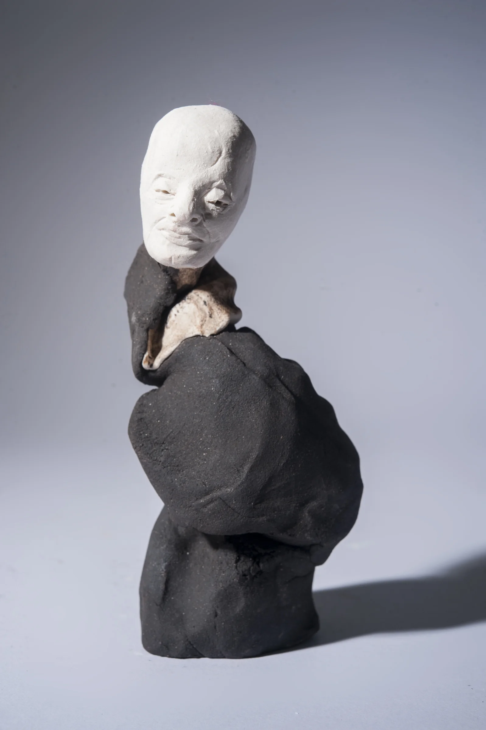 The Aul Doll \ porcelain and black clay \ 17cm x 7 cm \ Norwood Photography.