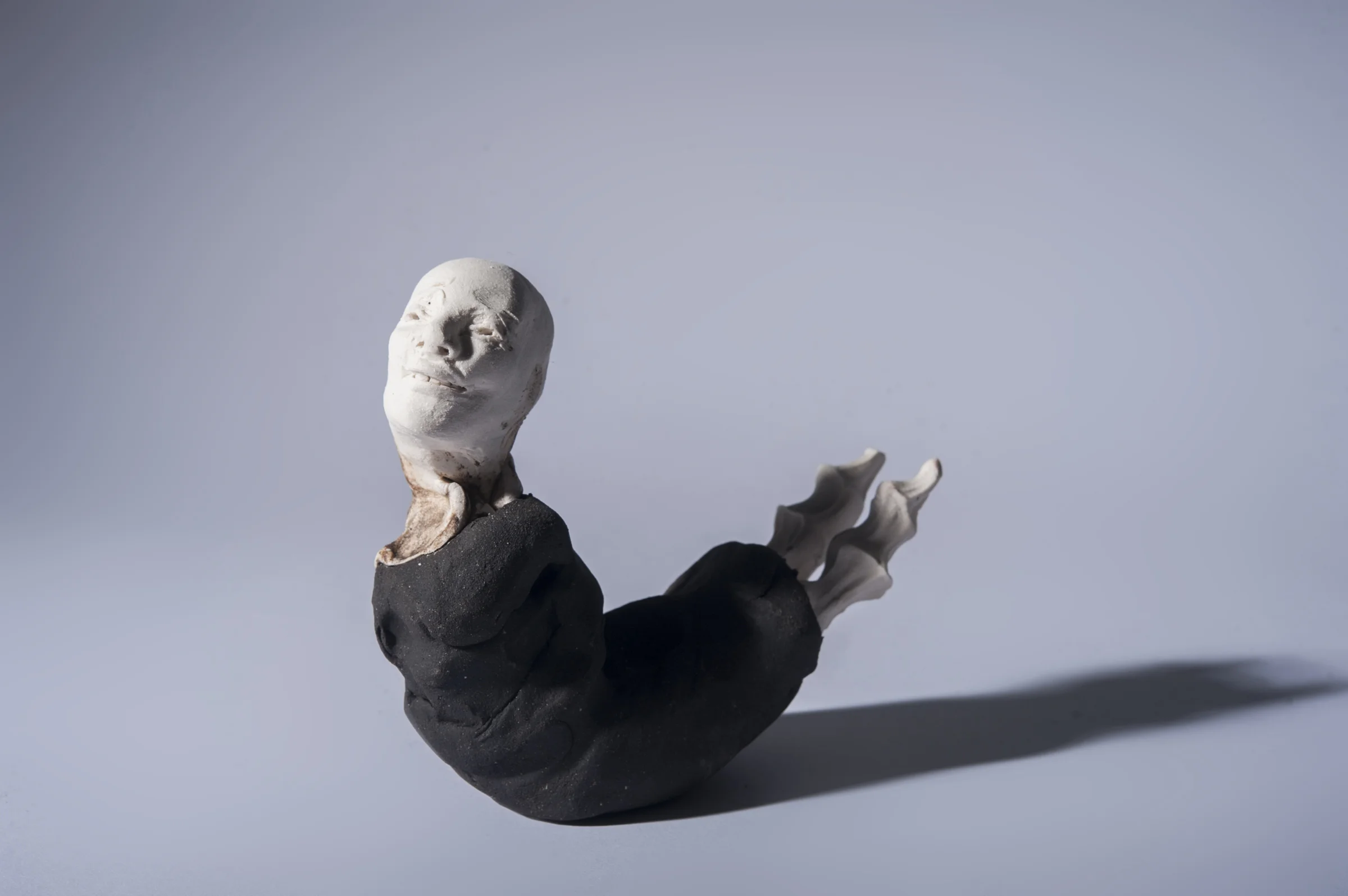 The Fool \ porcelain and black clay \ 16cm x 6cm \ Norwood Photography.