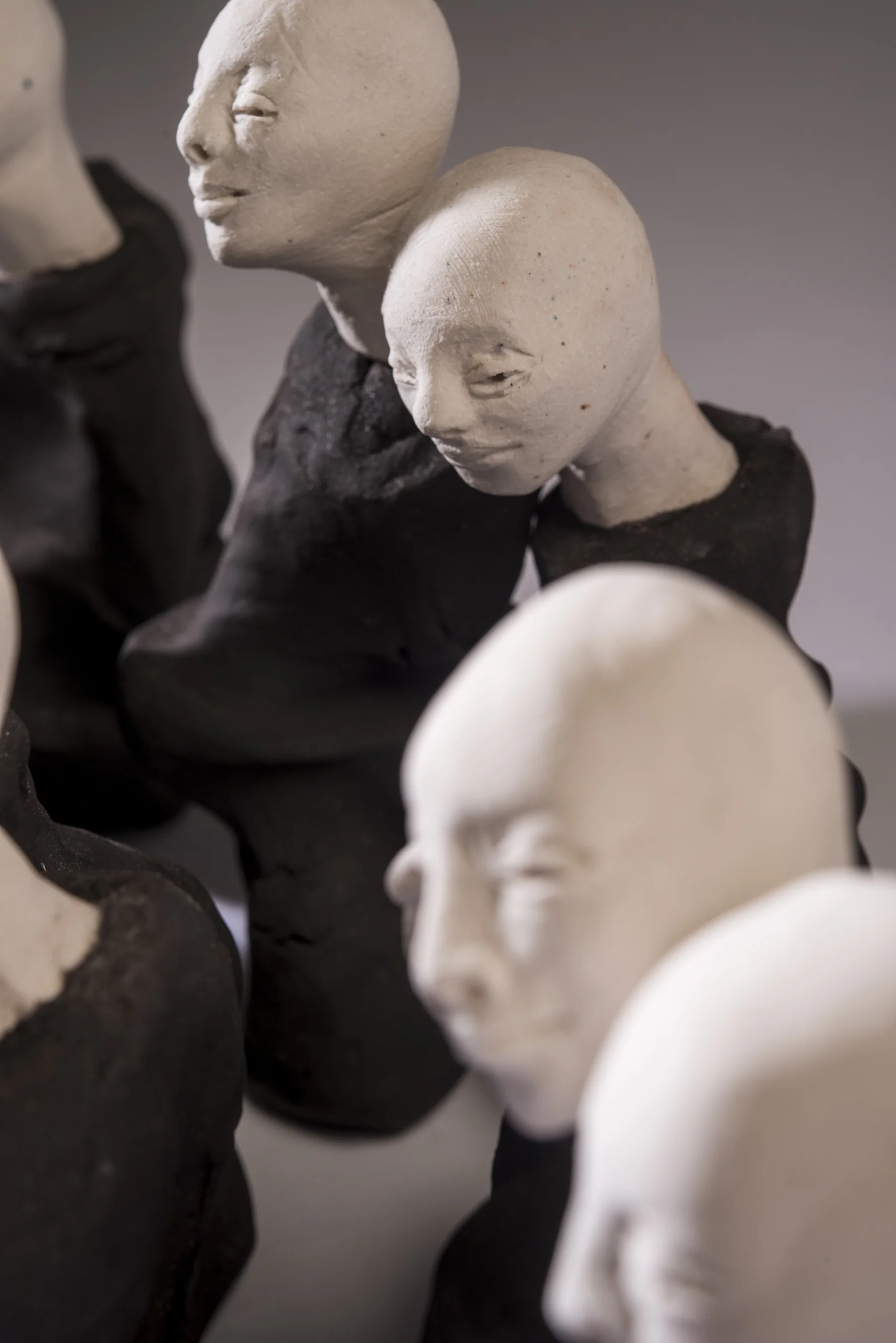 Crowd II \ porcelain and black clay \ dimensions variable \ Norwood Photography.
