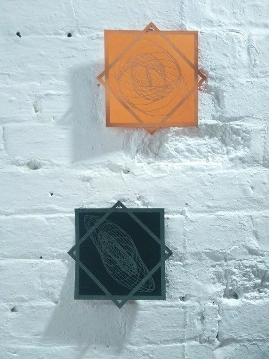 Drawings from the Harmonograph, laser engraved into card.