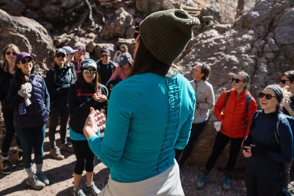Jacki Carr takes a break on the trail to speak about goal setting and fulfillment. Event photography by Sonja Salzburg of Sonja K Photography.&nbsp;