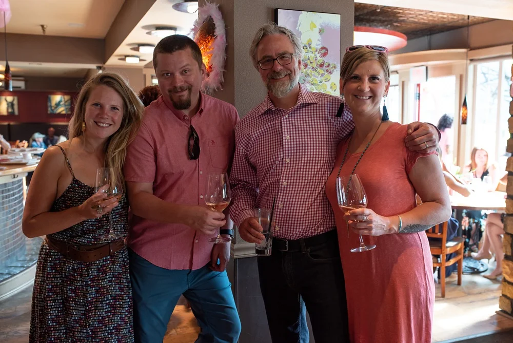 People partake in the Pinked. event by Fortified Collaborations at Cafe Vino in Fort Collins, Colorado. Event and food and beverage photography by Sonja Salzburg of Sonja K Photography.&nbsp;
