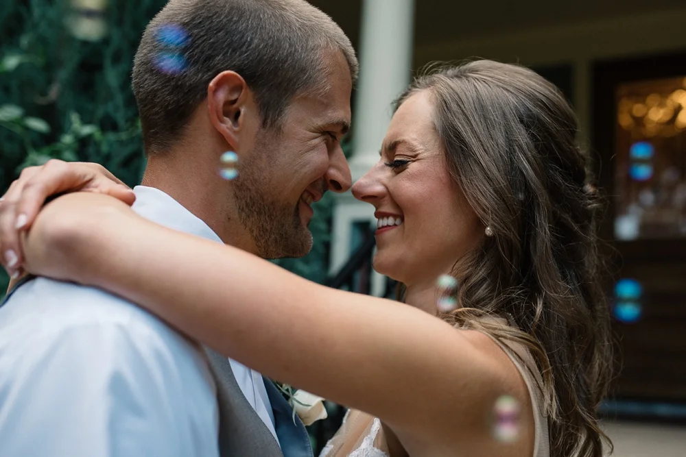 A bride and groom on their wedding day at the Tapestry House in Laporte, Colorado. Wedding photography by Sonja Salzburg of Sonja K Photography.