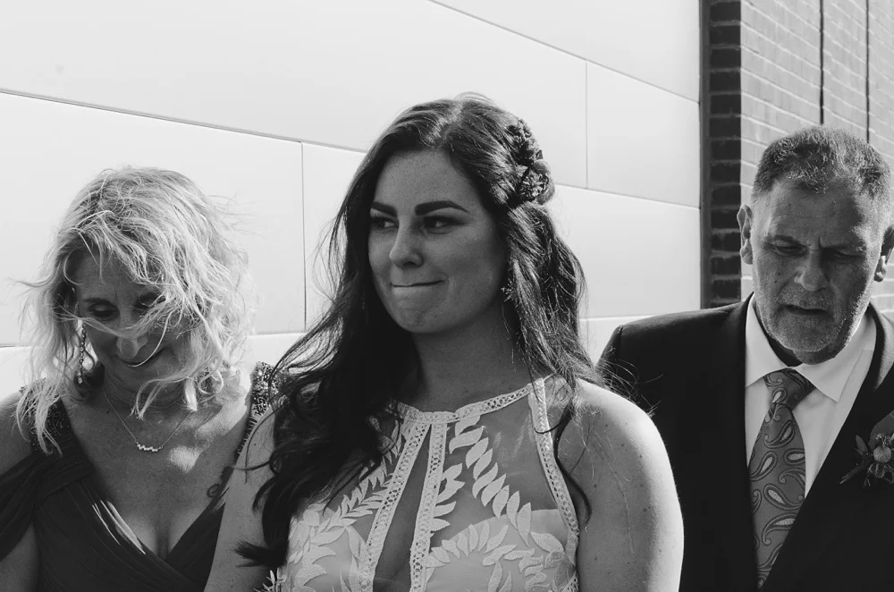 The bride just before she walks into her wedding ceremony at Ginger and Baker in Fort Collins, Colorado. Wedding photography by Sonja Salzburg of Sonja K Photography.