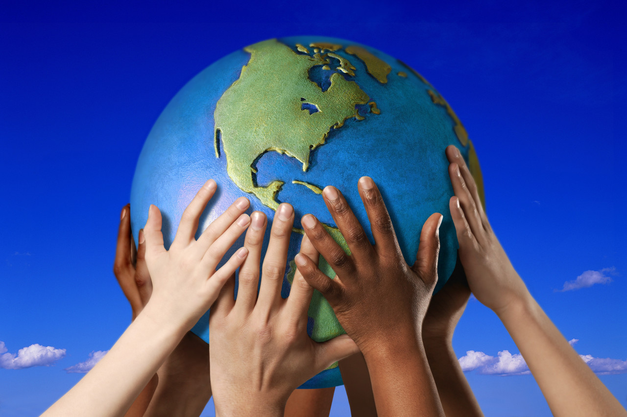 kids hands globe.jpg