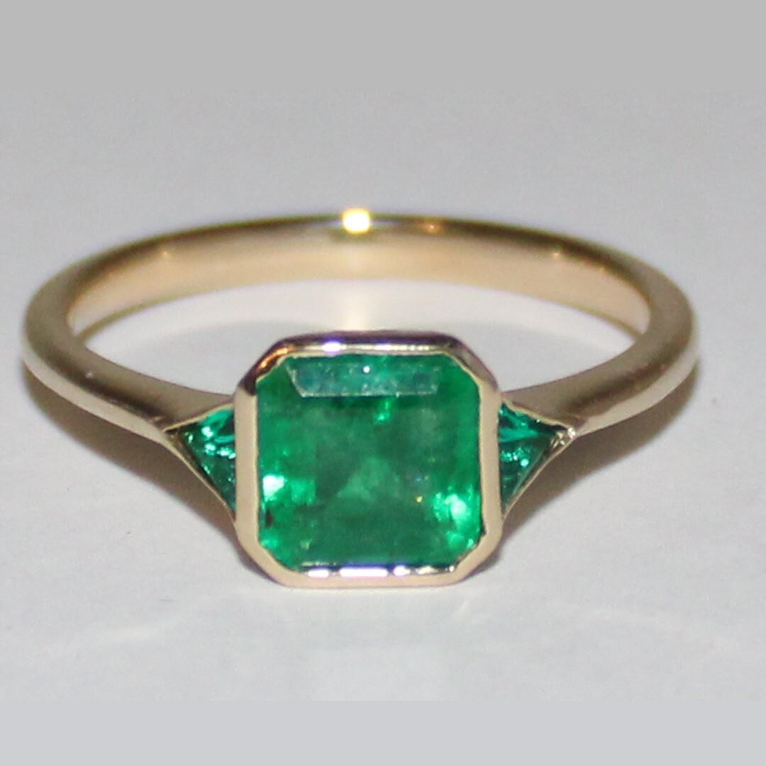 She said yes 🙌 

Custom made engagement ring  in 14k yellow gold and a stunner of an Emerald.